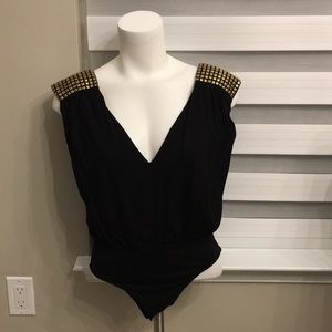 Asos black and gold sexy back out bodysuit size 4